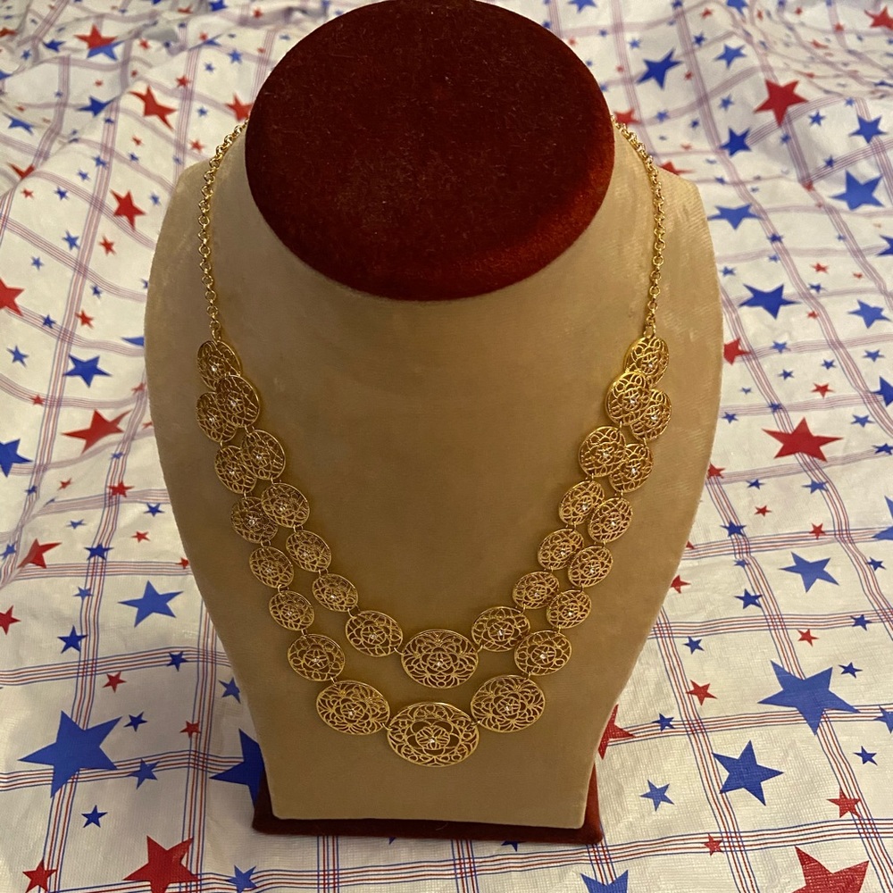 Gold tone geometric necklace with crystals